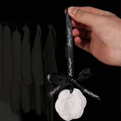 Indoor ceramic stone fragrance diffuser hanging for home use solid light car aromatherapy camellia pendant decoration